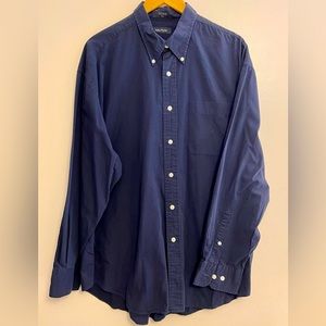 Mens nautica long sleeve button down shirt. One pocket on front. Blue cotton.
